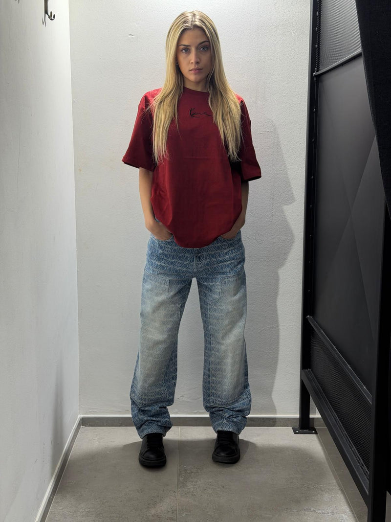 jeans karl kani con lettere in rilievo