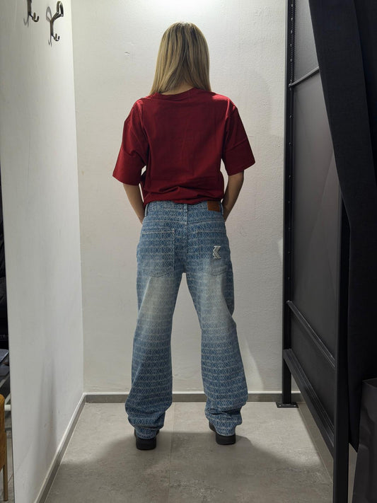 jeans karl kani con lettere in rilievo